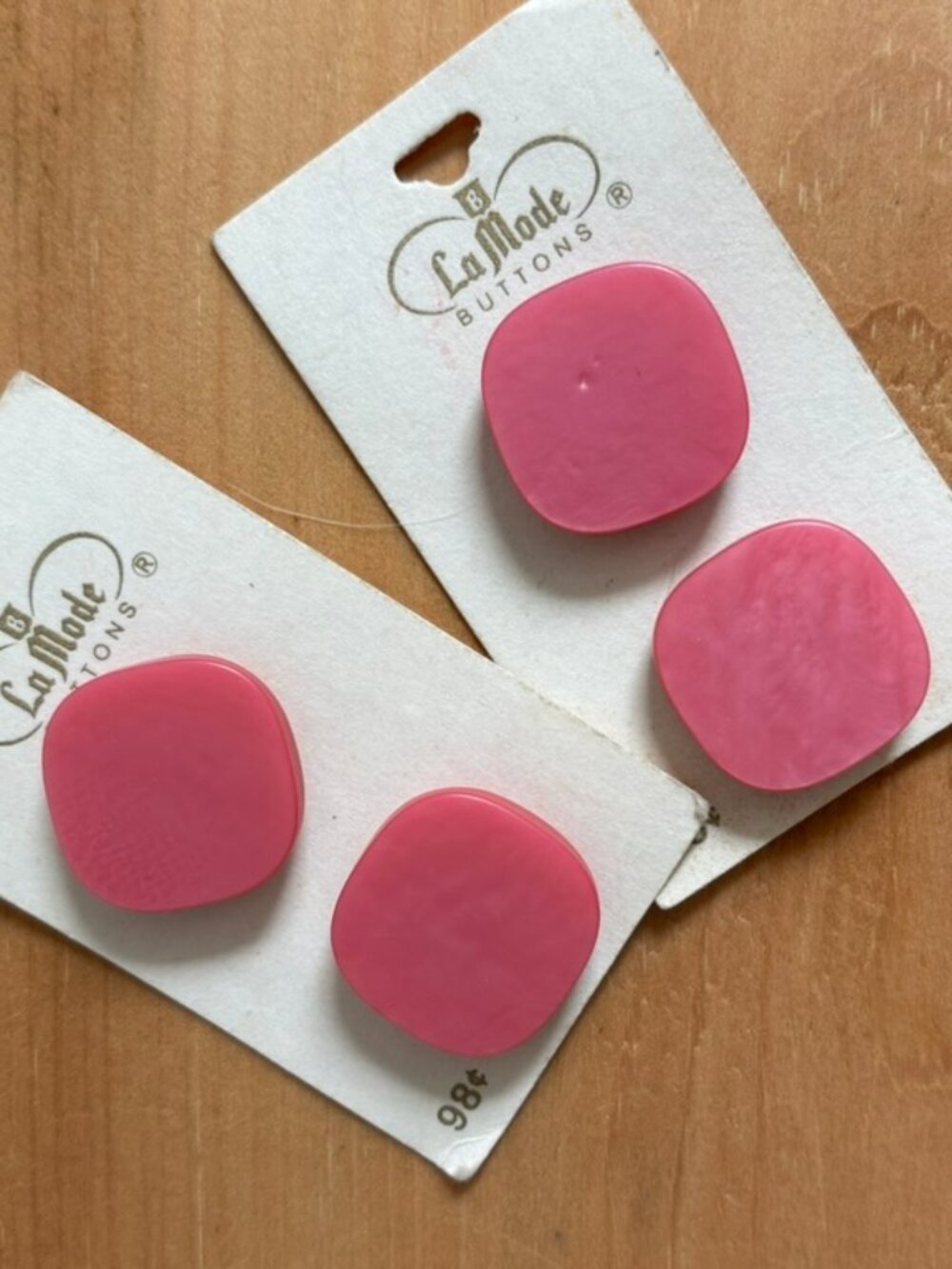 Vintage La Mode NOS buttons with a pink, matte, square-shaped design